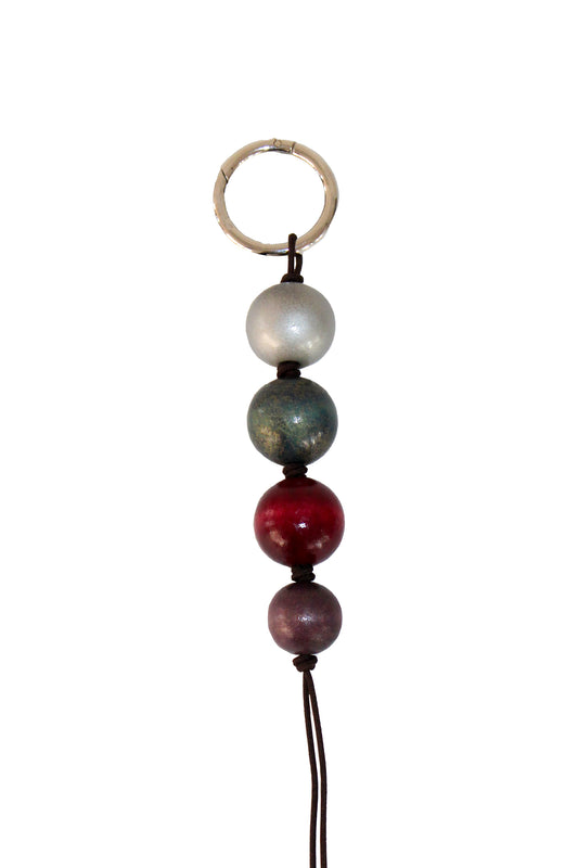 Glazed wooden ball charm