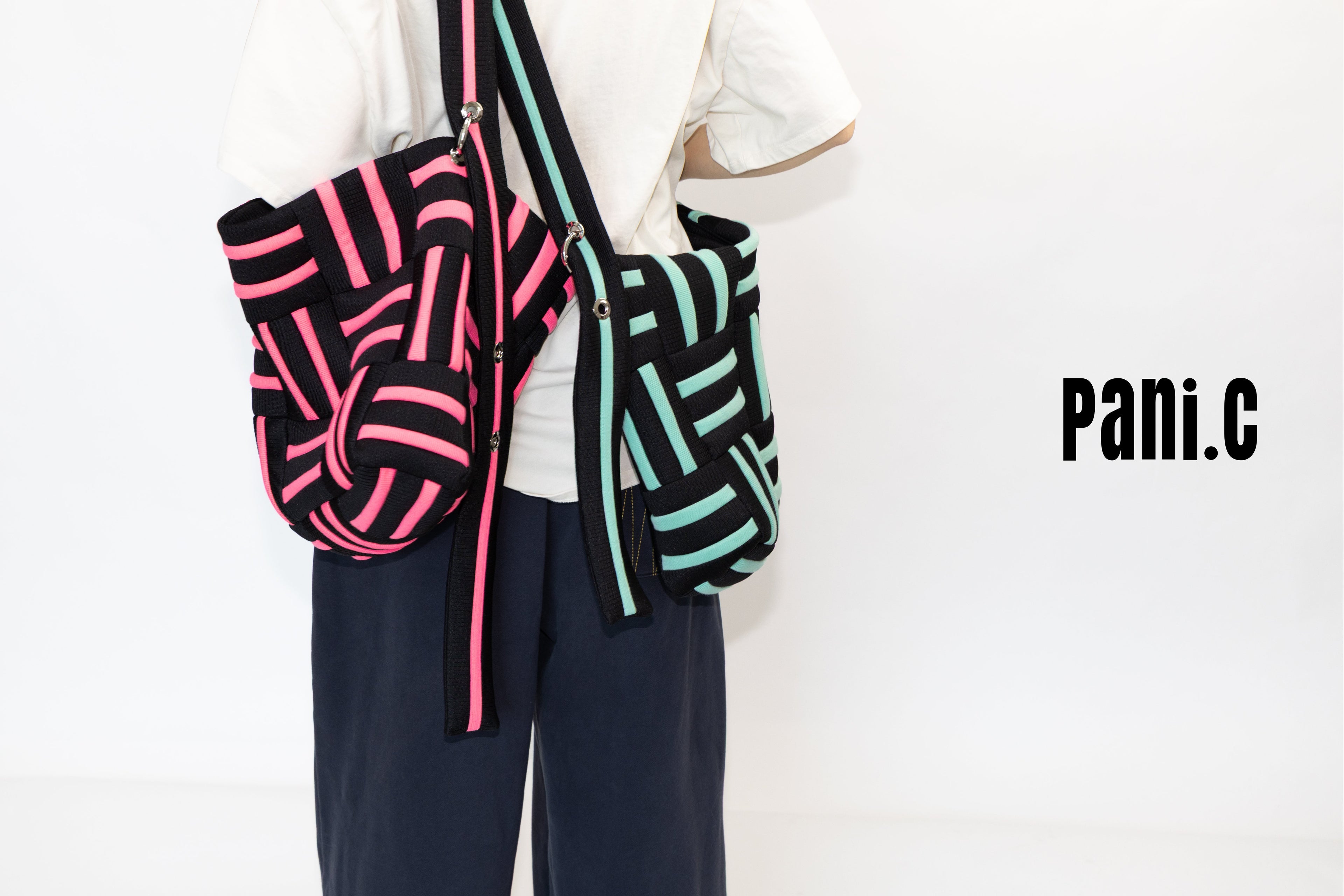 Two colorful bags with geometric patterns on a white background, featuring the brand 'Pani.C'.