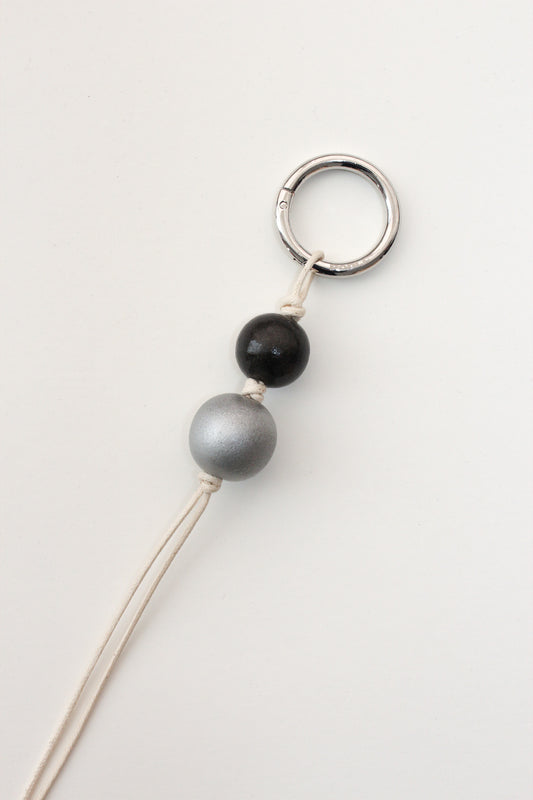Glazed wooden ball charm white