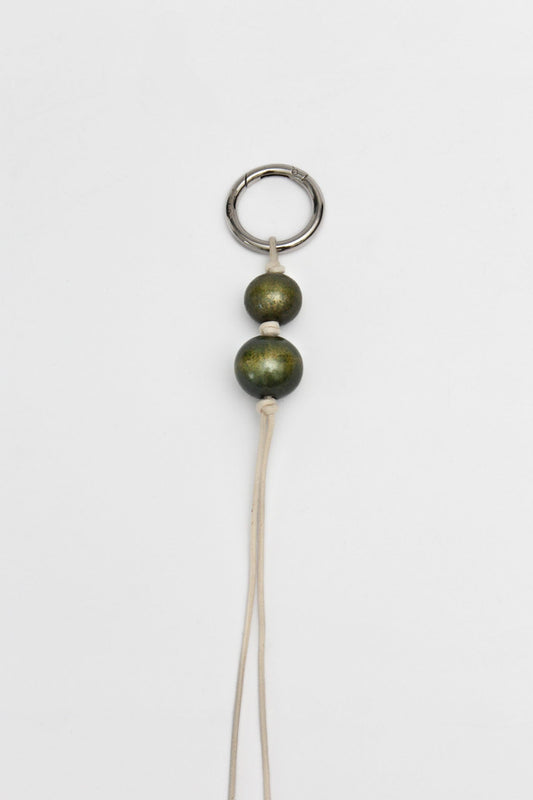 Glazed wooden ball charm green