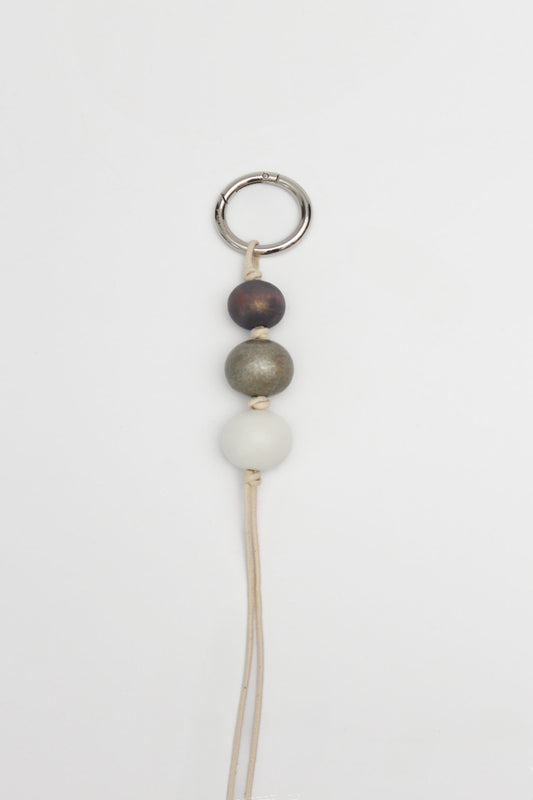 Glazed wooden ball charm purple