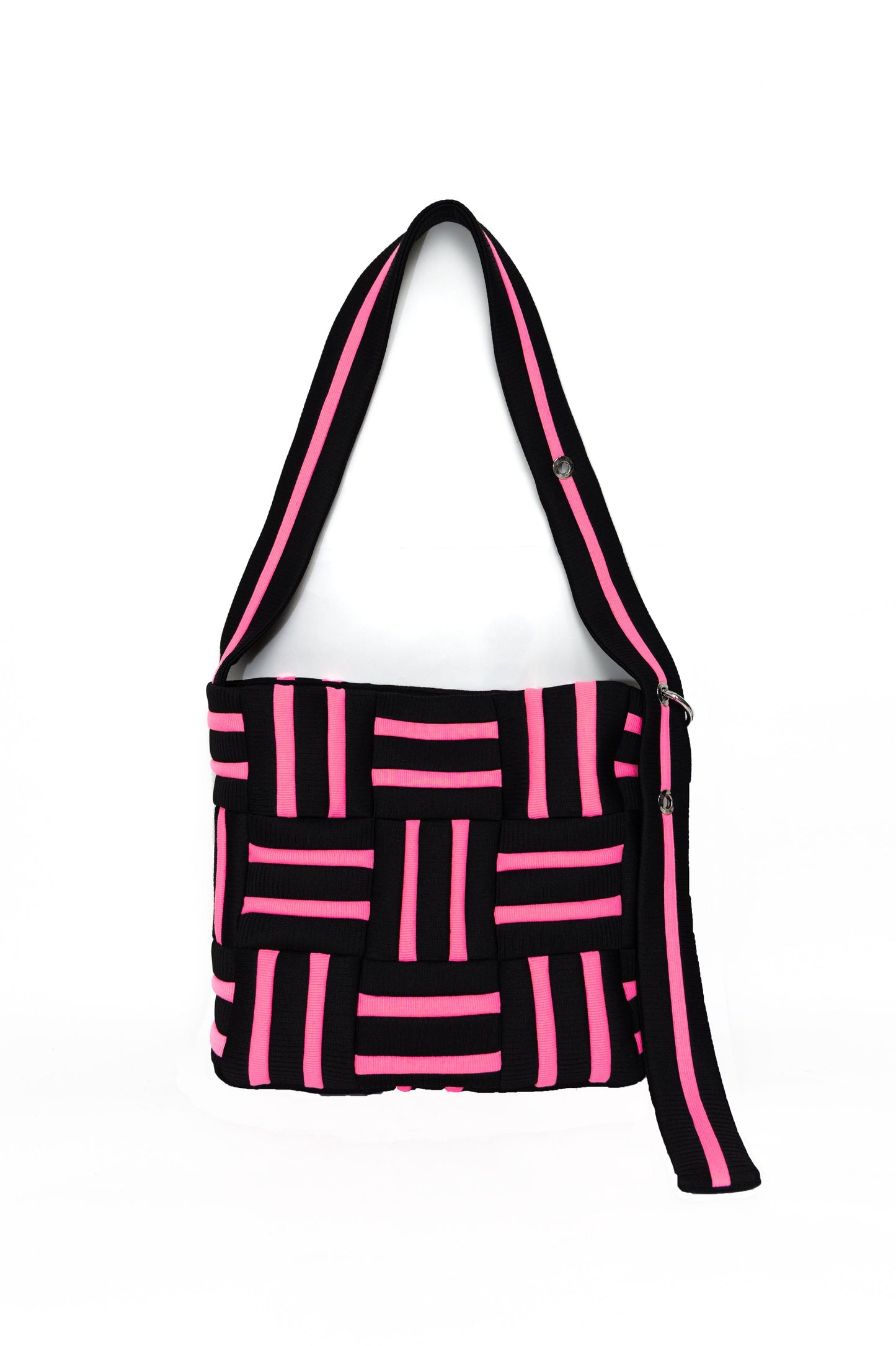 Black and pink geometric patterned bag on a white background